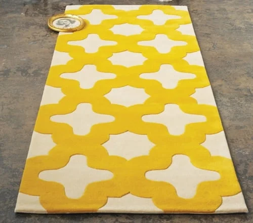 Žltý kusový koberec